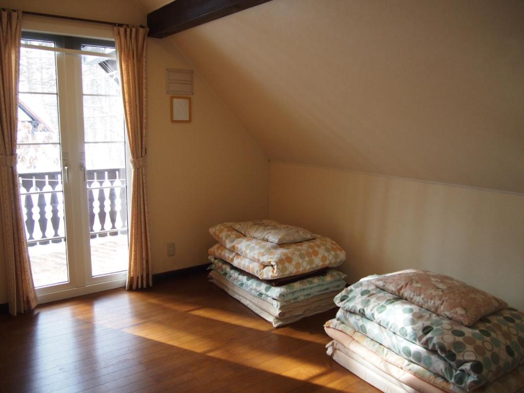 Postel nebo postele na pokoji v ubytování Guesthouse Canterbury