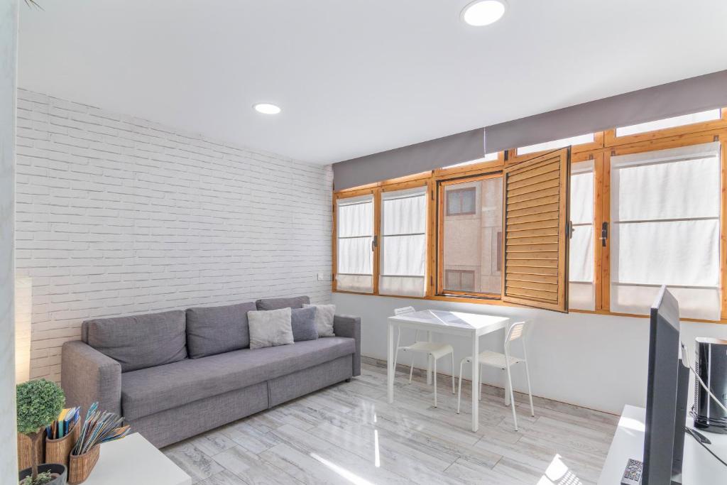 TV a/nebo společenská místnost v ubytování Apartamento Acuario Arinaga
