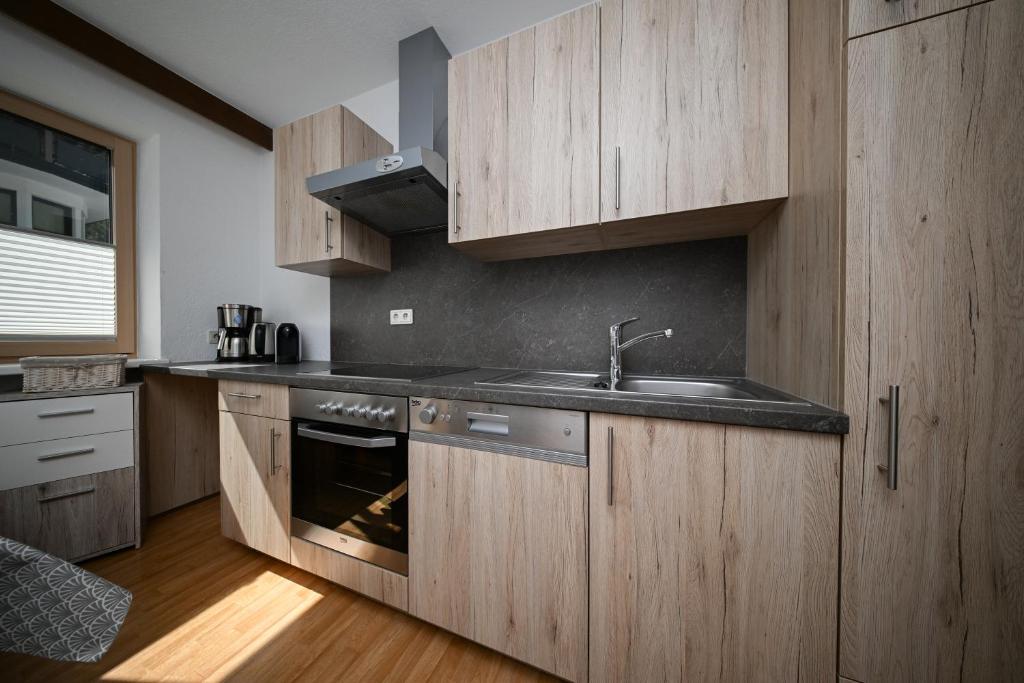 Kuchyňa alebo kuchynka v ubytovaní Haus Alpengruß