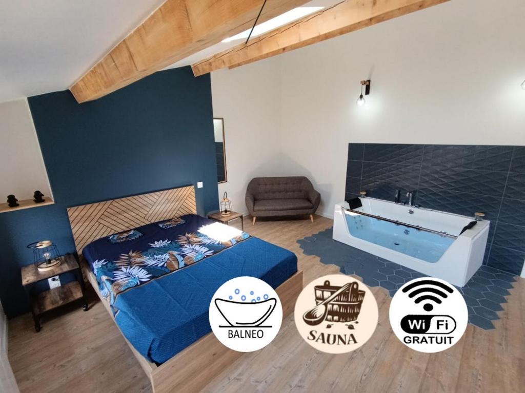 a bedroom with a bed and a bath tub at Escapade bien-être avec Sauna et Balnéo - ChezBross' La Parenthèse in Aboën