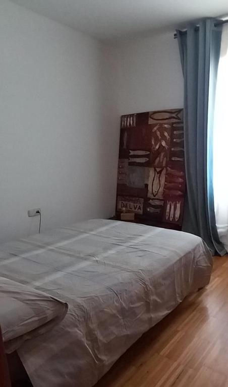 Postel nebo postele na pokoji v ubytování Happy Nest in Pals Village