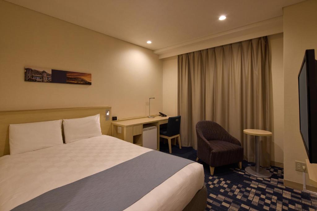 TV a/nebo společenská místnost v ubytování Kobe Sannomiya Tokyu REI Hotel