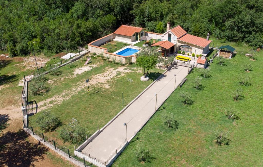 an aerial view of a house with a swimming pool at Country house Desne by Villas Guide in Desne