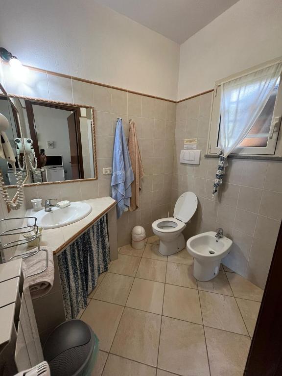 Koupelna v ubytování Agriturismo La Carlina