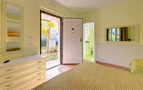 Postel nebo postele na pokoji v ubytování La Piazzetta Affittacamere B&B