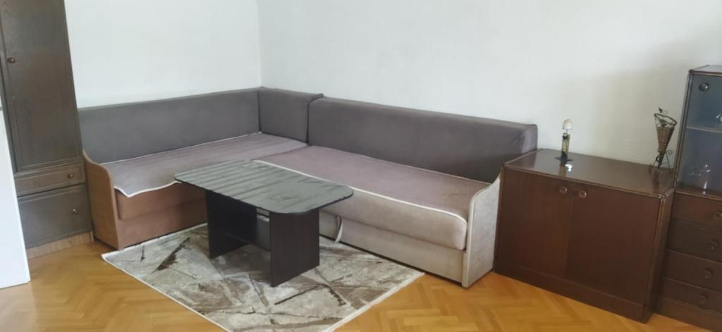 a couch and a table in a living room at Tara 1 in Bitola
