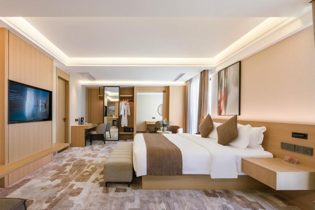 TV a/nebo společenská místnost v ubytování JD POLMAN Hotel