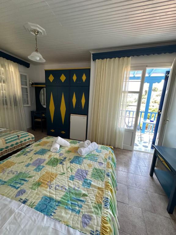 Postel nebo postele na pokoji v ubytování Galini Hellenic Hospitality