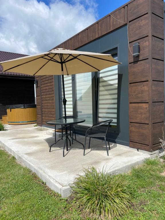 Patio nebo venkovní prostory v ubytování Pas Alksnius
