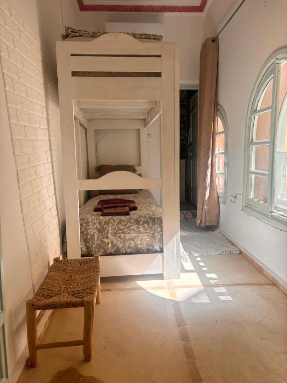 Postel nebo postele na pokoji v ubytování Riad Sanwa