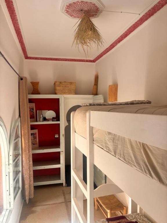 Postel nebo postele na pokoji v ubytování Riad Sanwa
