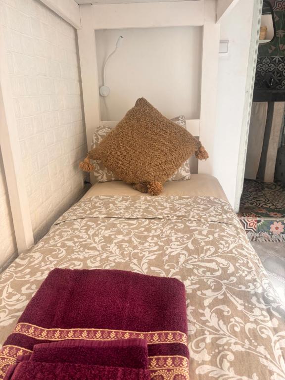 Postel nebo postele na pokoji v ubytování Riad Sanwa