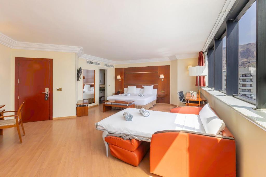 Postel nebo postele na pokoji v ubytování Hotel Moon Dreams Portomagno