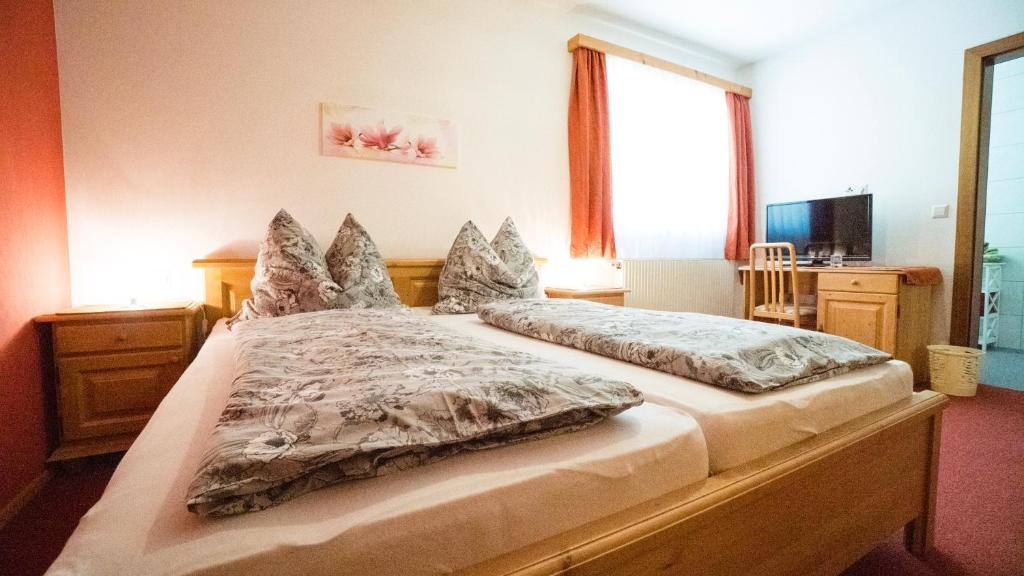 Postel nebo postele na pokoji v ubytování Huberbauer
