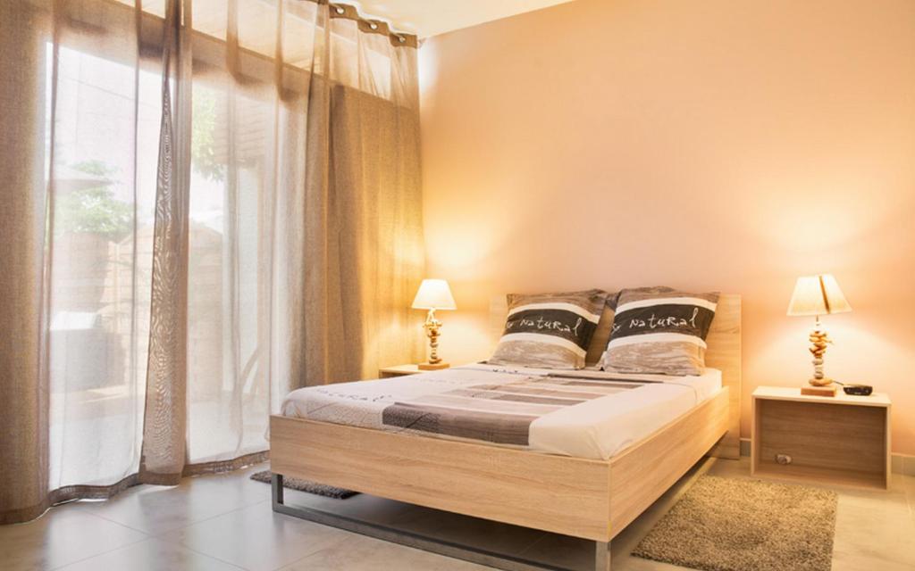 Postel nebo postele na pokoji v ubytování Villa Saline