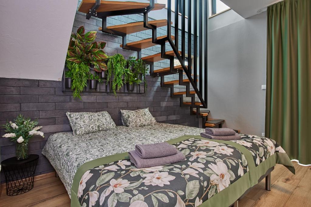 Postel nebo postele na pokoji v ubytování Apartamenty Śniadanie do Łóżka