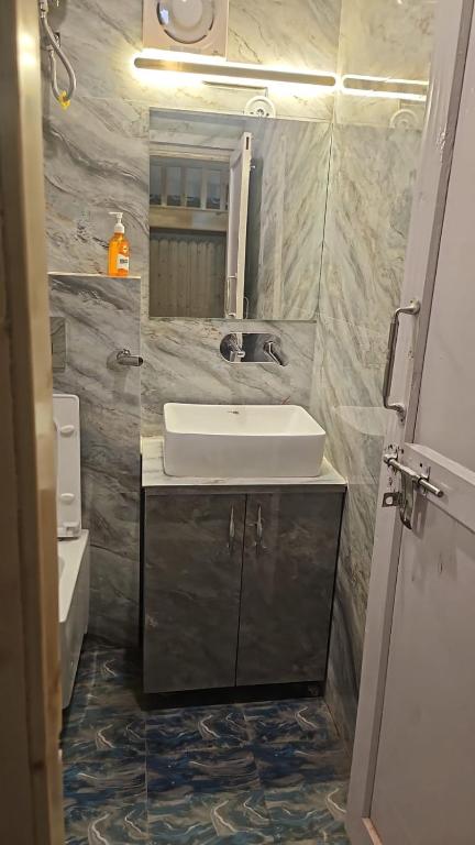 Ένα μπάνιο στο Shree Guru Home Stay