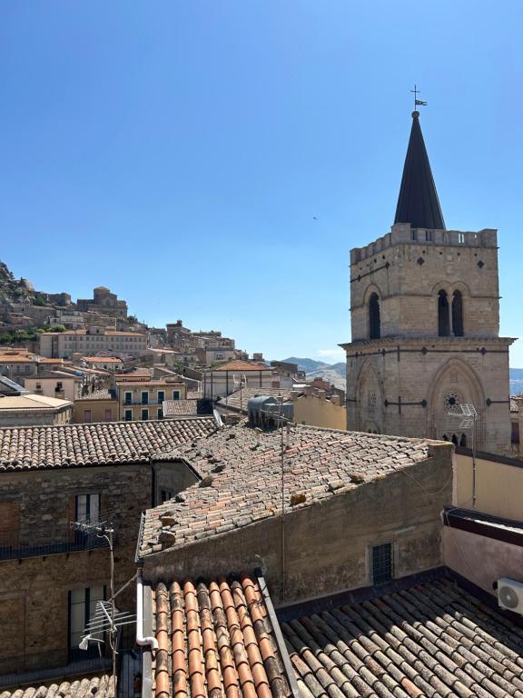 a view of a city with a church and roofs at B&b Al Centro Nicosia in Nicosia
