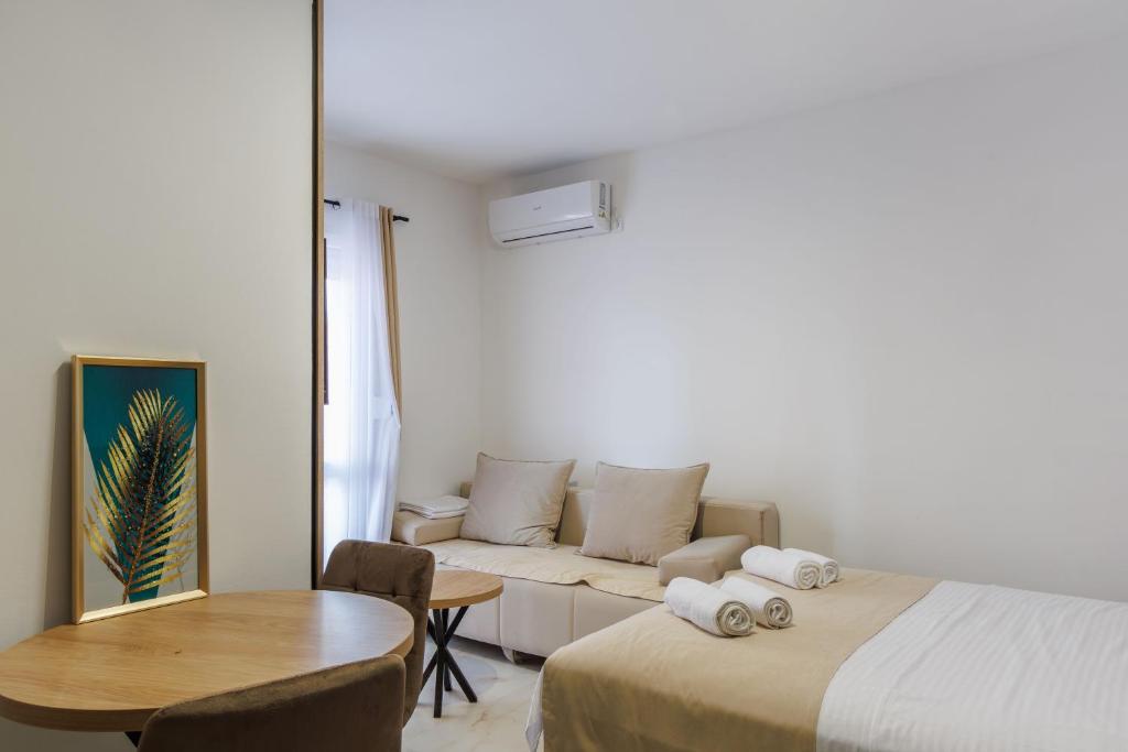 Postel nebo postele na pokoji v ubytování Apartments Donna
