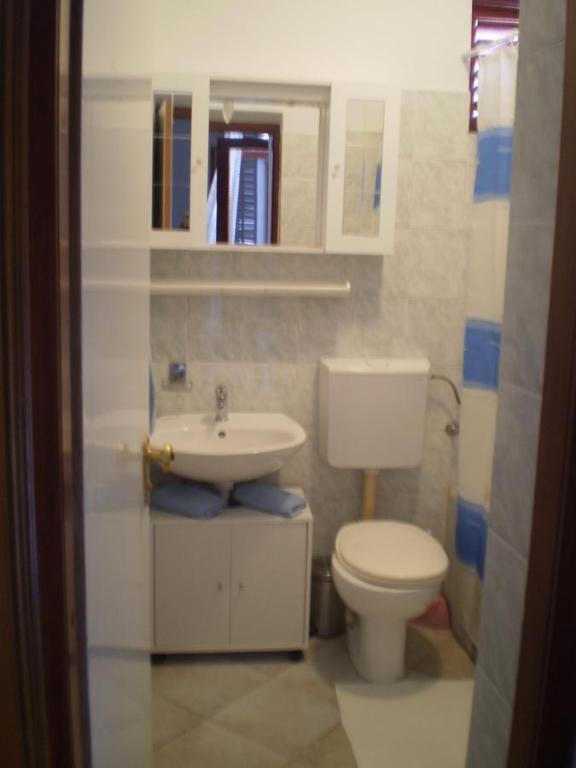 Kúpeľňa v ubytovaní Apartments Kuzman