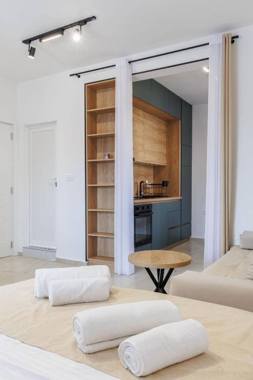 Postel nebo postele na pokoji v ubytování Apartments Donna