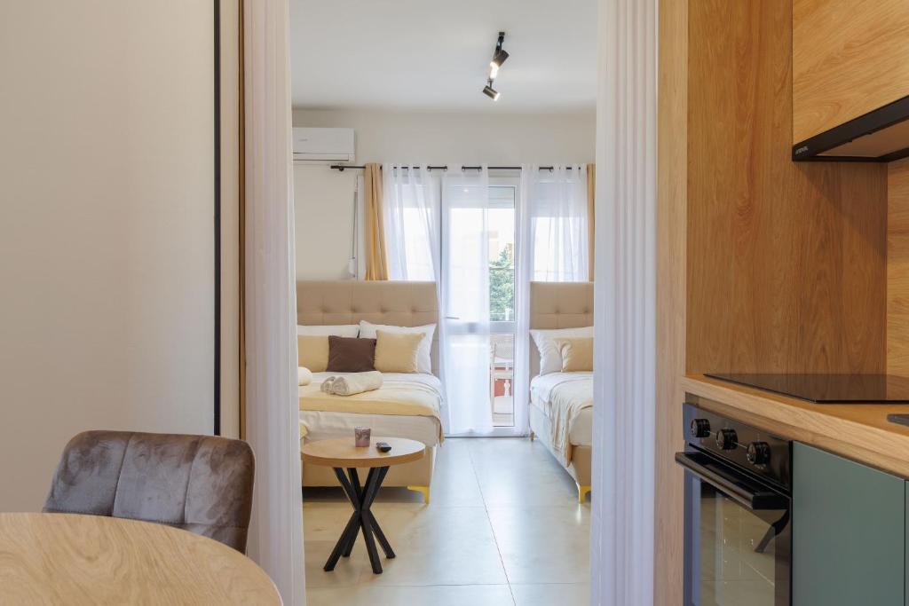 Postel nebo postele na pokoji v ubytování Apartments Donna