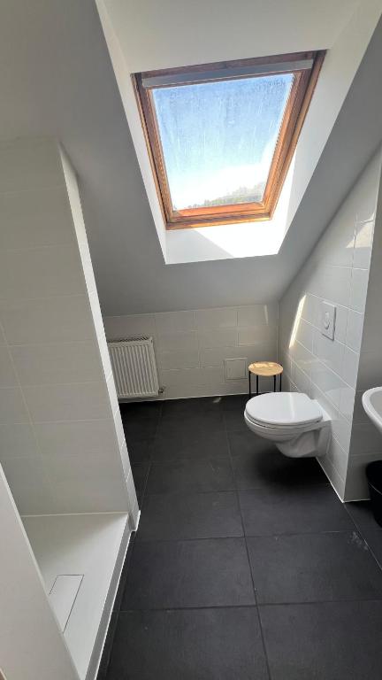 Kúpeľňa v ubytovaní Apartment Zhang