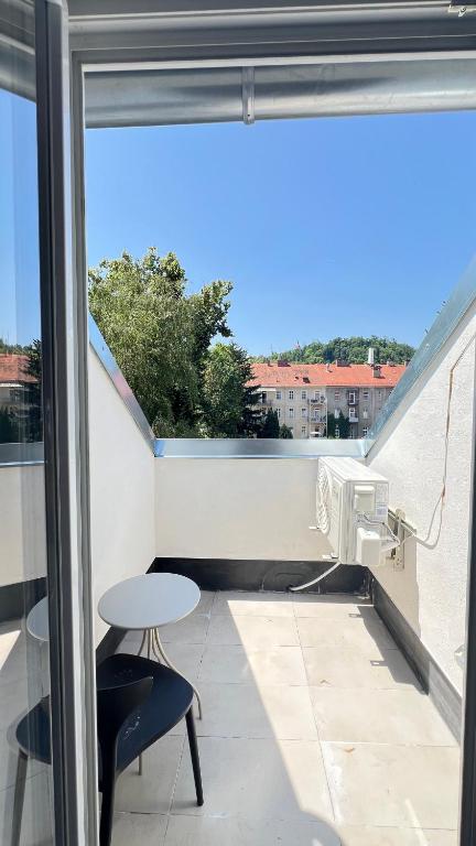 Balkón alebo terasa v ubytovaní Apartment Zhang