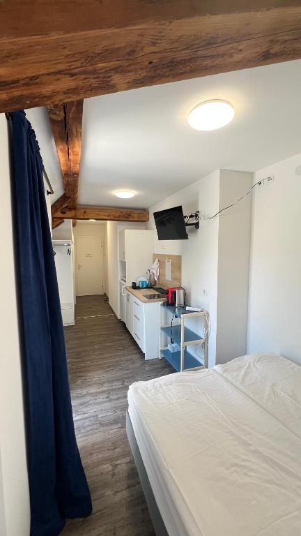 Kuchyňa alebo kuchynka v ubytovaní Apartment Zhang