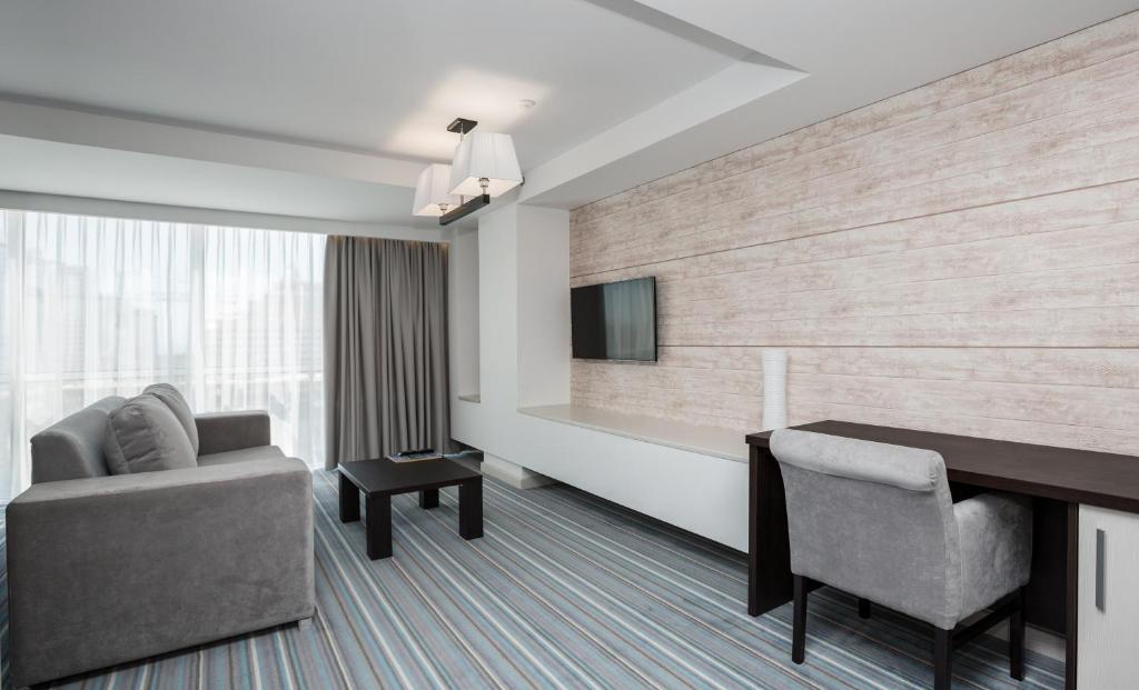 TV a/nebo společenská místnost v ubytování Atlantic Garden Resort
