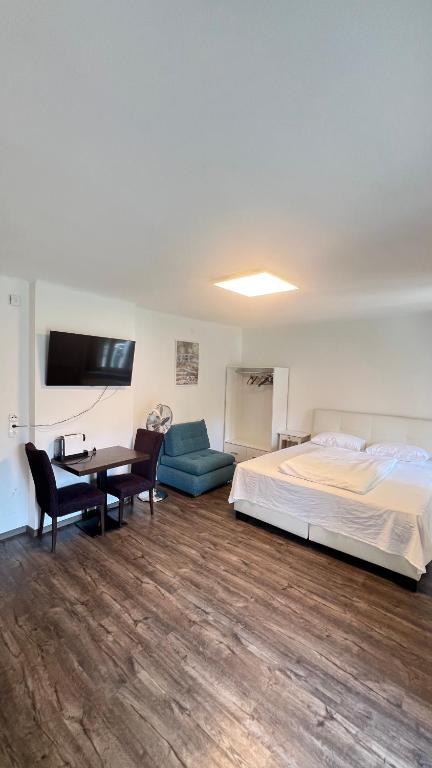 Posteľ alebo postele v izbe v ubytovaní Apartment Zhang