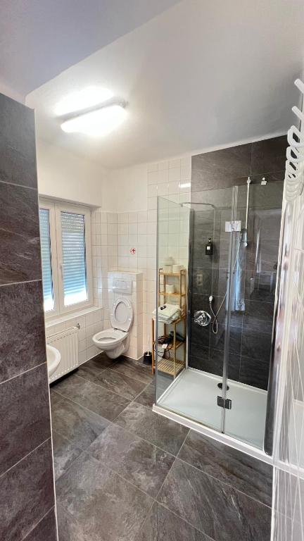 Kúpeľňa v ubytovaní Apartment Zhang