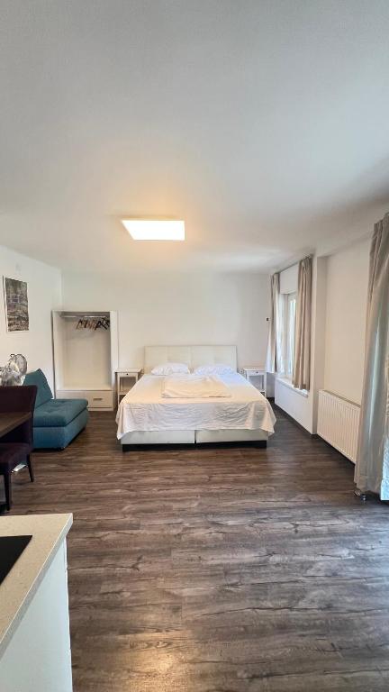 Posteľ alebo postele v izbe v ubytovaní Apartment Zhang