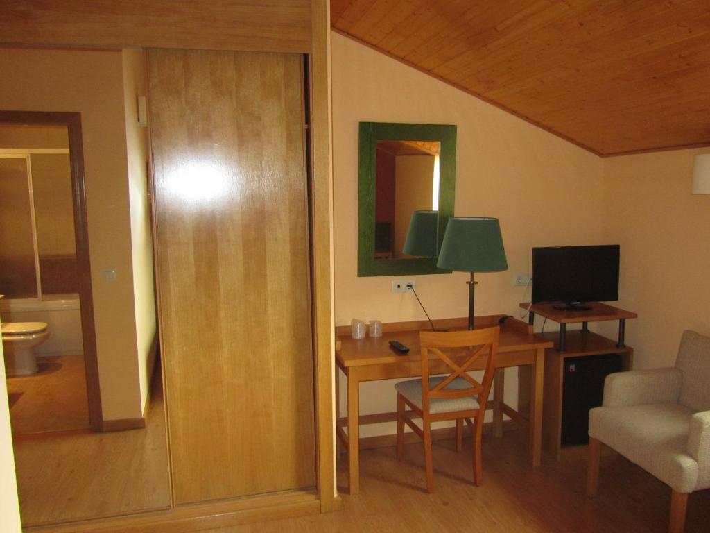 TV a/nebo společenská místnost v ubytování Hotel Galayos