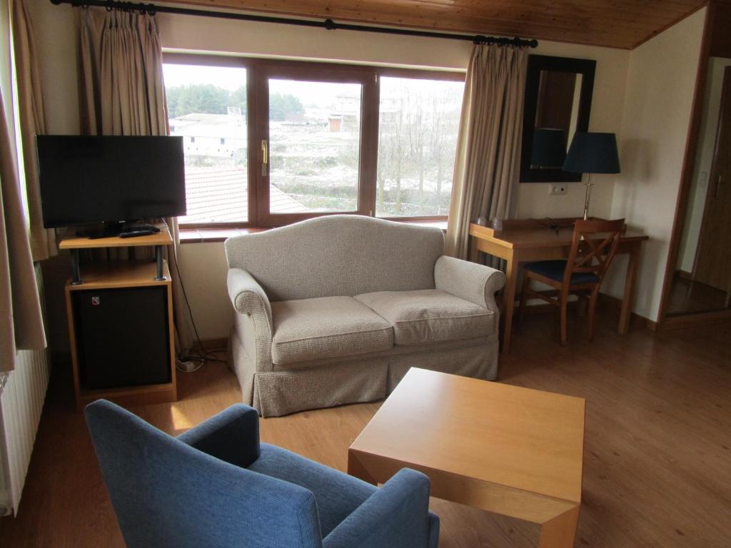TV a/nebo společenská místnost v ubytování Hotel Galayos