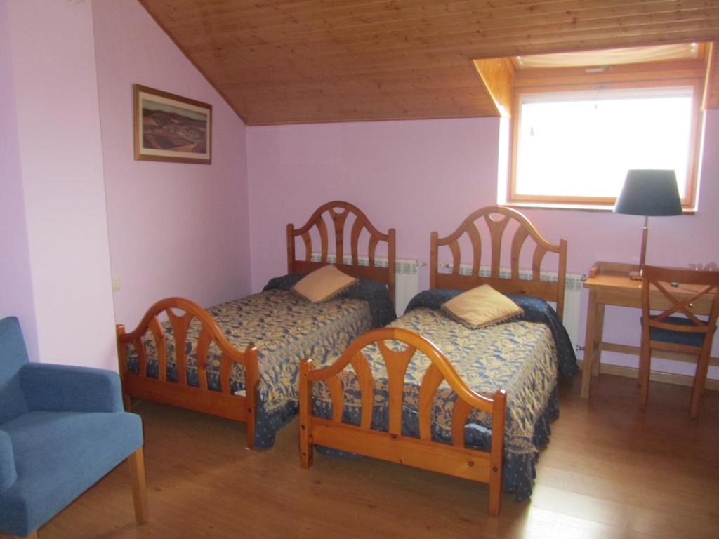 Postel nebo postele na pokoji v ubytování Hotel Galayos