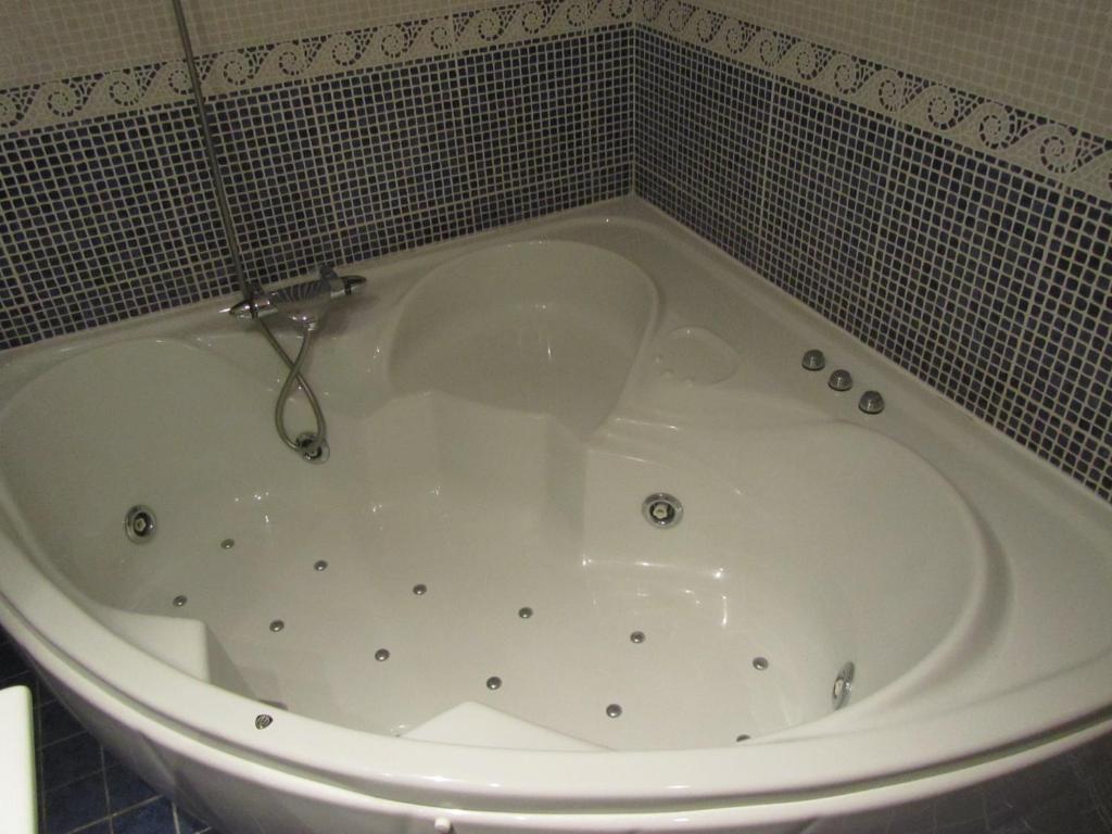 Koupelna v ubytování Hotel Galayos