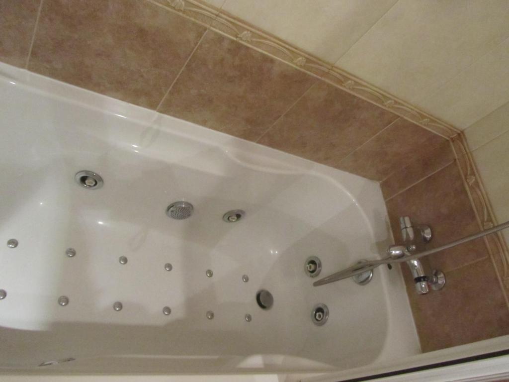 Koupelna v ubytování Hotel Galayos