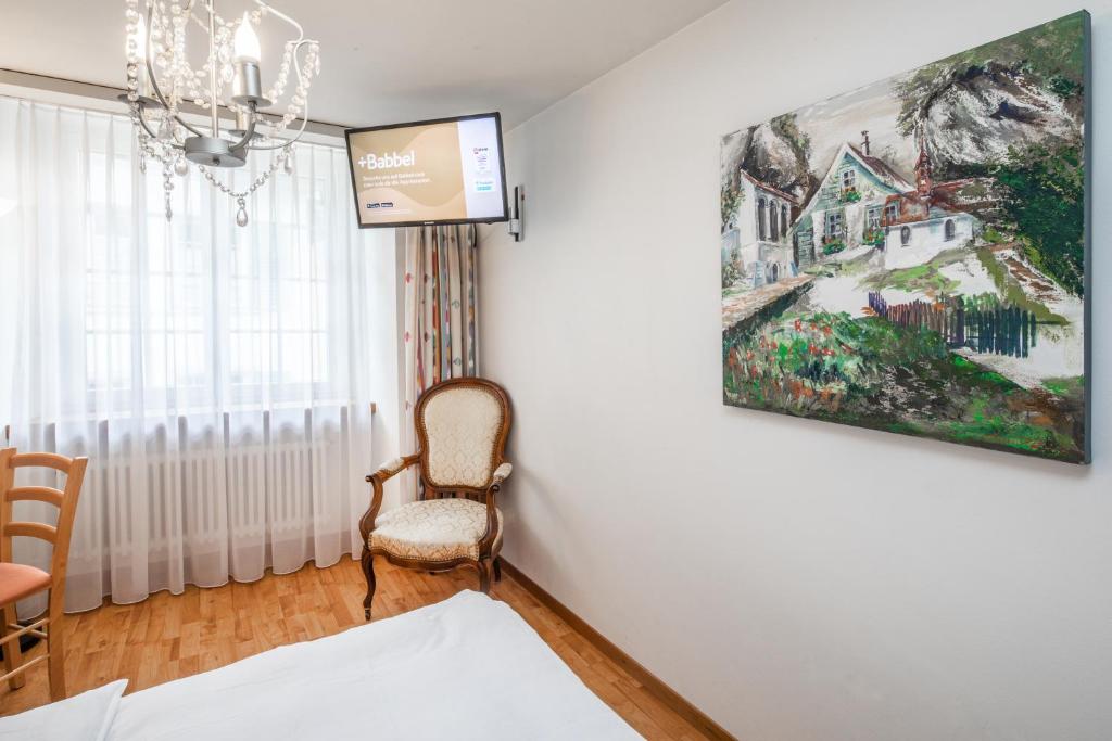 TV a/nebo společenská místnost v ubytování Hotel Roter Turm