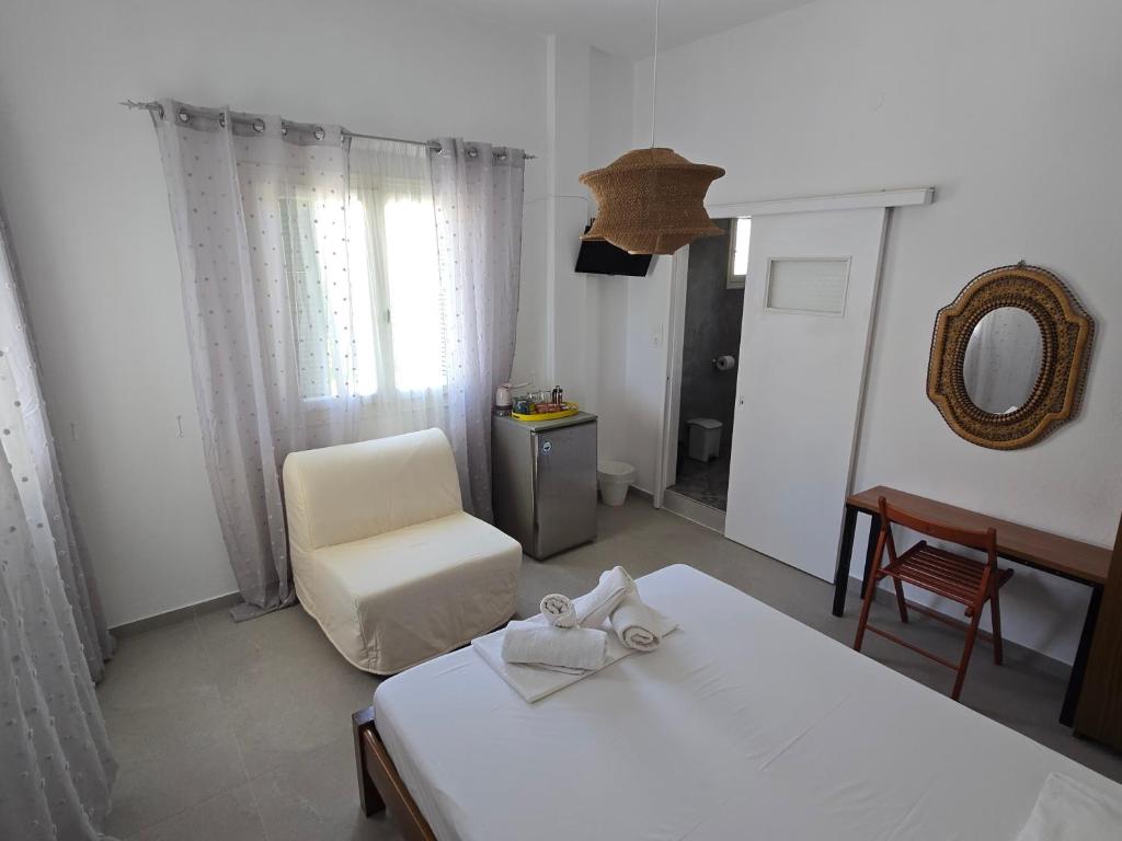Postel nebo postele na pokoji v ubytování Oasis
