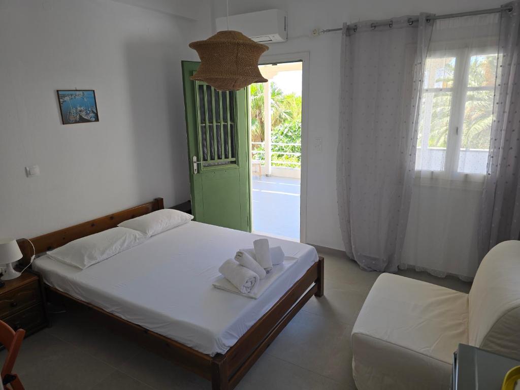 Postel nebo postele na pokoji v ubytování Oasis