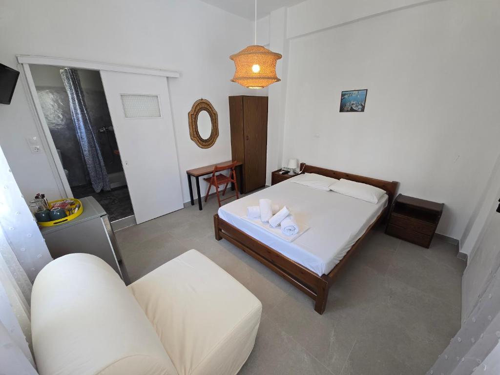 Postel nebo postele na pokoji v ubytování Oasis