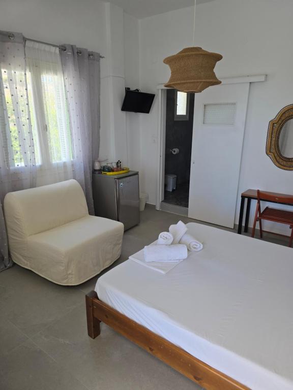 Postel nebo postele na pokoji v ubytování Oasis