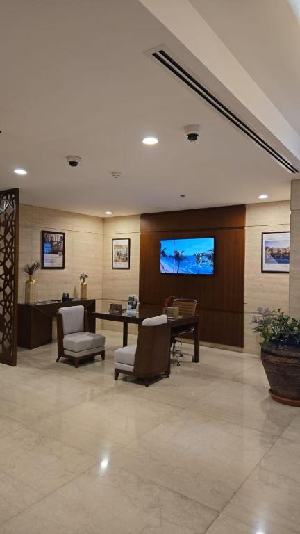 TV o dispositivi per l'intrattenimento presso Fraser Suites Muscat