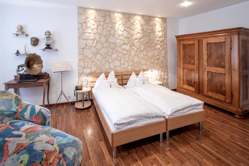 Postel nebo postele na pokoji v ubytování Hotel Roter Turm