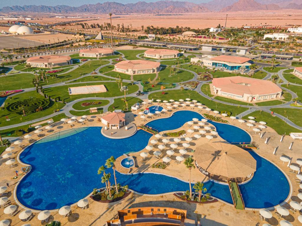 an aerial view of a resort with a pool at Pickalbatros Golf Luxury Suites - All Inclusive in Sharm El Sheikh