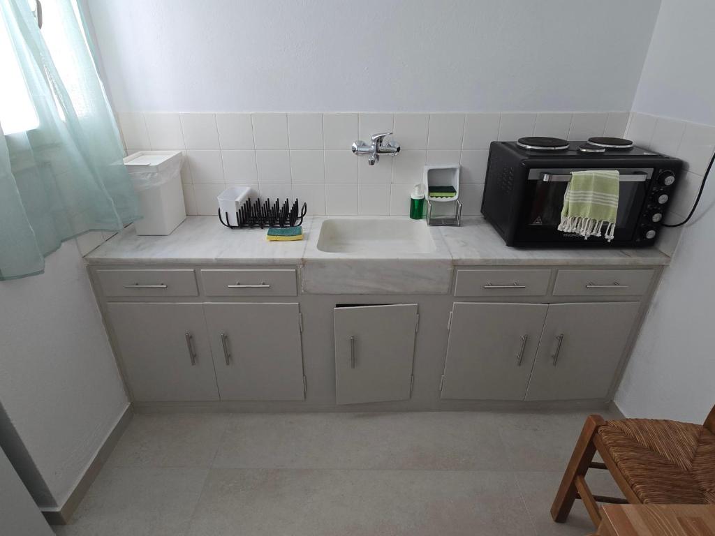 Kuchyň nebo kuchyňský kout v ubytování Oasis