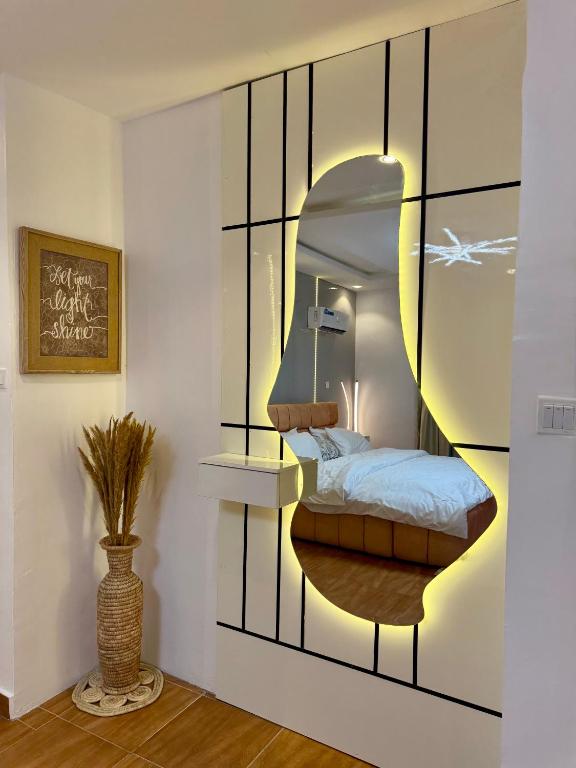 Postel nebo postele na pokoji v ubytování PENTAGON by Riz homes