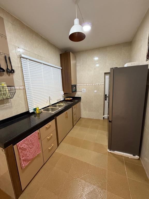 Kuchyň nebo kuchyňský kout v ubytování PENTAGON by Riz homes