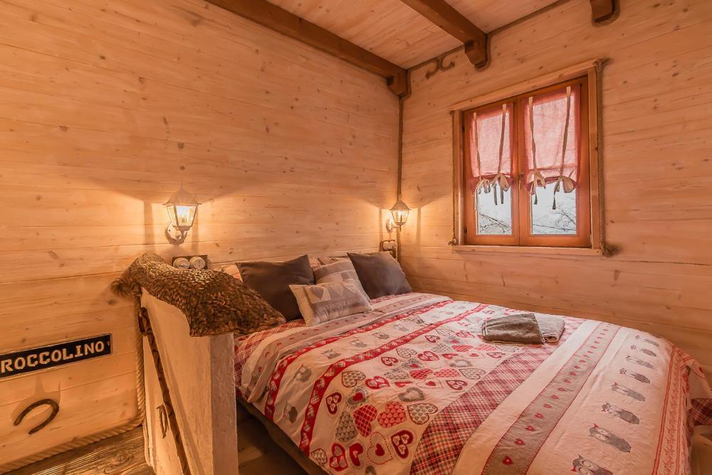 Postel nebo postele na pokoji v ubytování Il Roccolino
